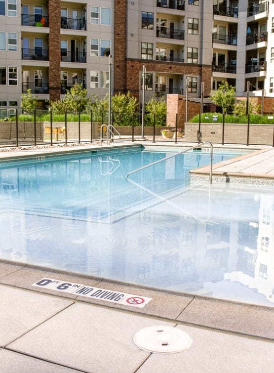 Apartment complex pool with quality Sandscape coping