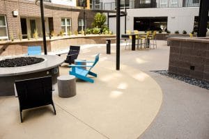 Sandscape® refined flatwork next to fire pit