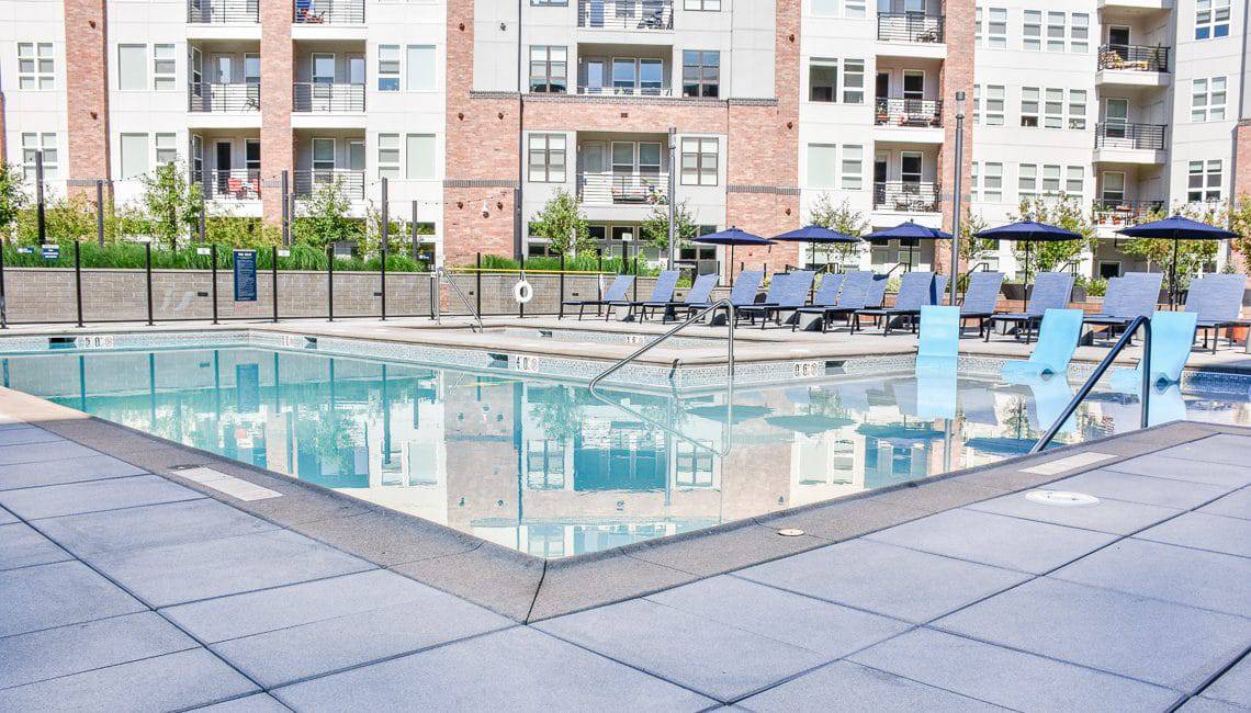 Apartment complex pool with quality Sandscape coping