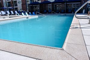 Up close apartment complex pool with quality Sandscape coping