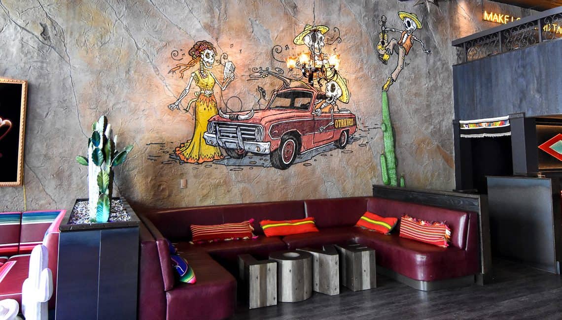 Artistic concrete wall veneer on Otra Vez Cantina wall is all about aesthetics.