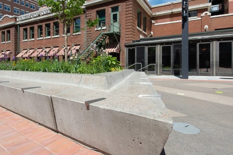 McGregor Square polished concrete benches in plaza at Downtown Denver.