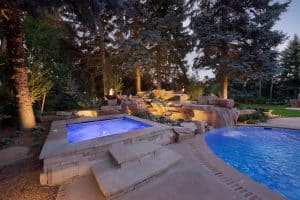 Dream backyard at private residence with sandstone waterfall and spa.
