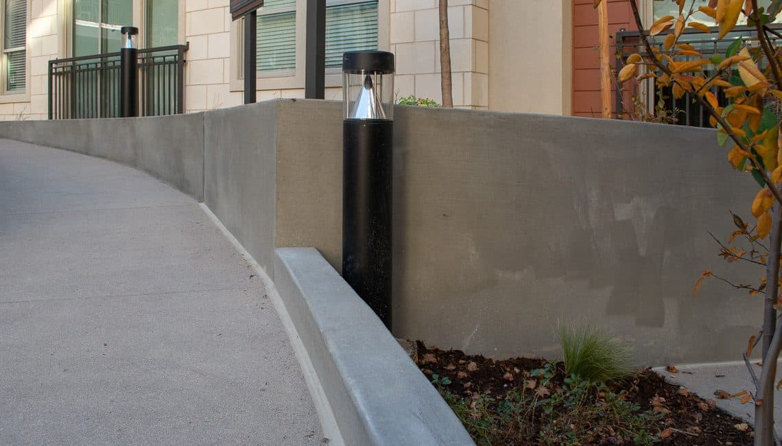 Photo of concrete wall and ramp at the Flatiron Marketplace Apartments.